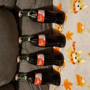 4 Seasons Greetings Commemorative Coca Cola 8 oz unopened bottles ❤